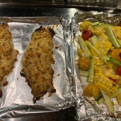 baked bass with a side of veggies