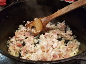 cook meat, onion, and garlic in pot