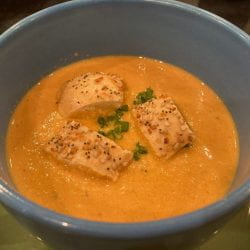 perch bisque in serving bowl with croutons on top